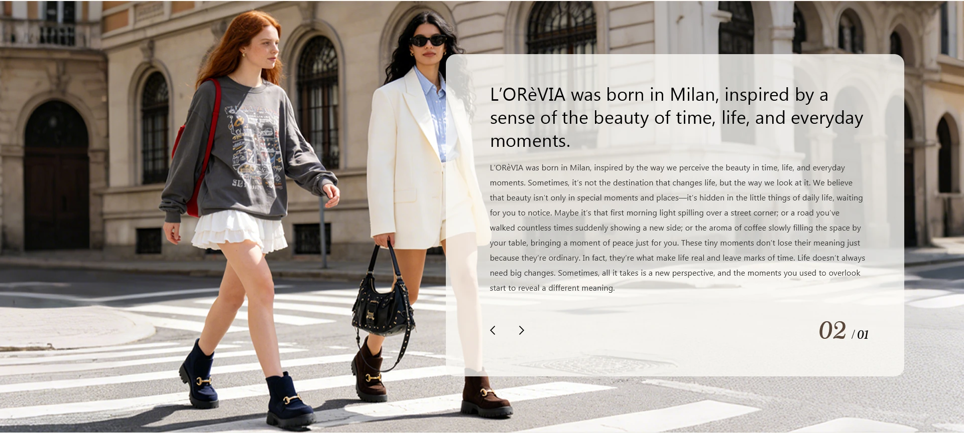 Two women walking through Milan with L’Orèvia handbags